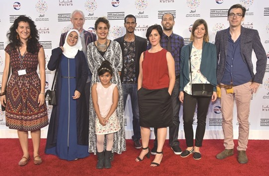 Qatar-based filmmaker Suzannah Mirghani (fourth left) and other talents on Ajyal Red Carpet yesterday. PICTURE: Noushad Thekkayil