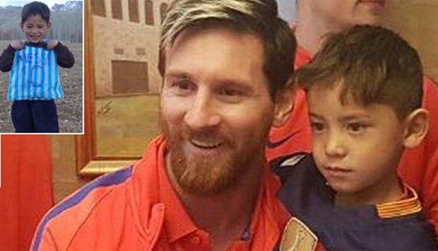 Lionel Messi with Afghan boy Murtaza Ahmadi