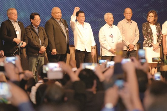President Rodrigo Duterte gestures as he meets with members of the Filipino community in the Cambodian capital Phnom Penh yesterday.