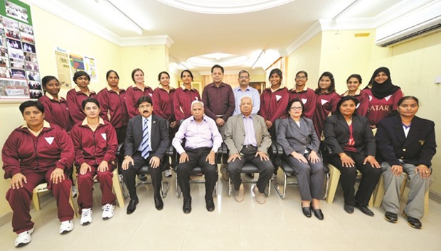 Qatar players pose with Qatar Cricket Association officials.