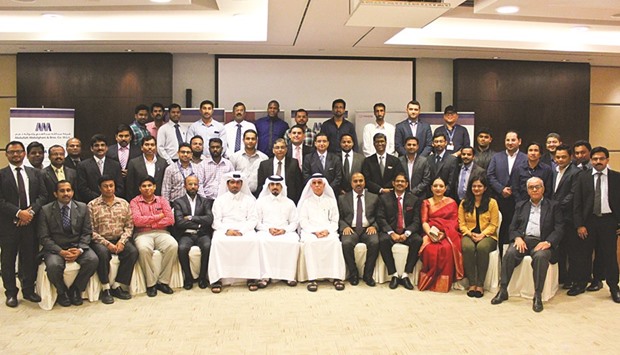 Members of the AAB spare parts division team with dealers.
