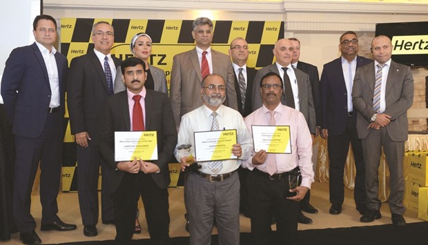 Hertz Qatar officials with employees recognised at the event yesterday evening. PICTURES: Shaji Kayamkulam