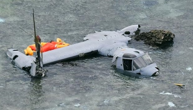 A wrecked US Marine Corps MV-22 Osprey aircraft that crash-landed in the sea off Nago is seen in Okinawa prefecture, Japan, in this photo taken by Kyodo on Wednesday.