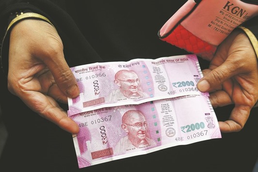 The rupee closed at 67.45 per US dollar yesterday, up 0.14% from its previous close of 67.54