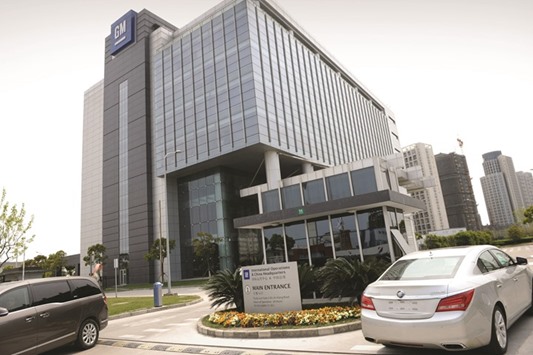 General Motorsu2019 China headquarters is seen in Shanghai. Shares of GM fell  yesterday after a Chinese official warned the government could slap a penalty on an unnamed US automaker for monopolistic behaviour.