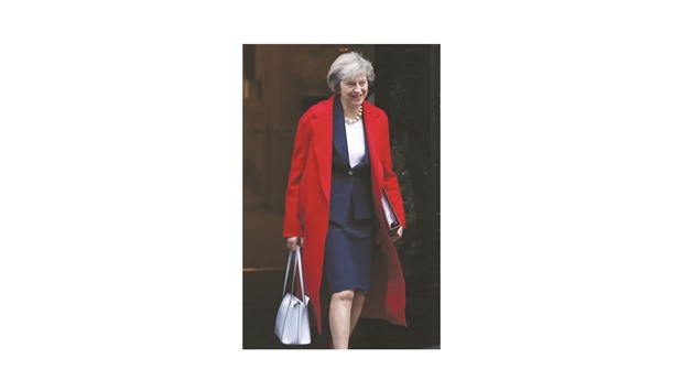 Prime Minister Theresa May leaves Downing Street in London to attend her final Prime Ministeru2019s Question Time of 2016 yesterday.