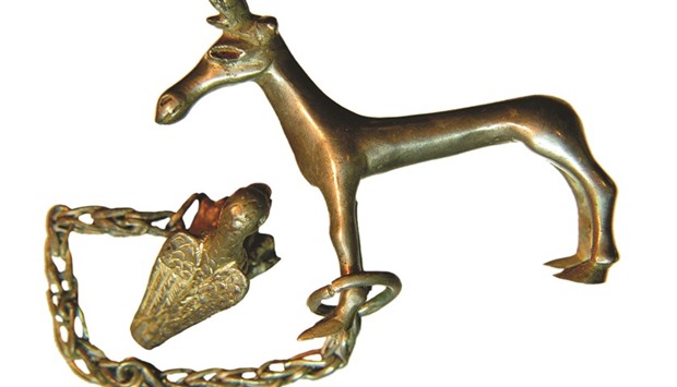 A 1st-century AD golden pendant in the shape of a deer, found in a grave at the necropolis of Ustu2019Alma and which is part of the u201cCrimea: Gold and Secrets of the Black Seau201d at the Allard Pierson Museum in Amsterdam.