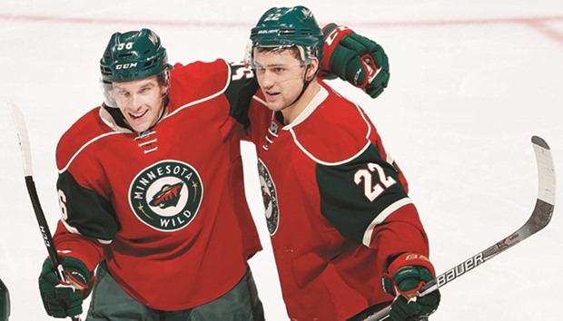 The Minnesota Wildu2019s Erik Haula (L) celebrates with Nino Niederreiter after scoring a goal in the second period against the Florida Panthers at the Xcel Energy Centre in St. Paul, Minnesota. PICTURE: Minneapolis Star Tribune/TNS