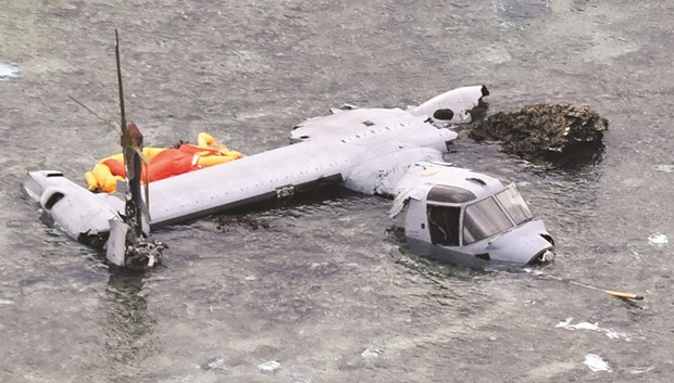 A wrecked US Marine Corps MV-22 Osprey aircraft that crash-landed in the sea off Nago is seen in Okinawa Prefecture, Japan, yesterday.