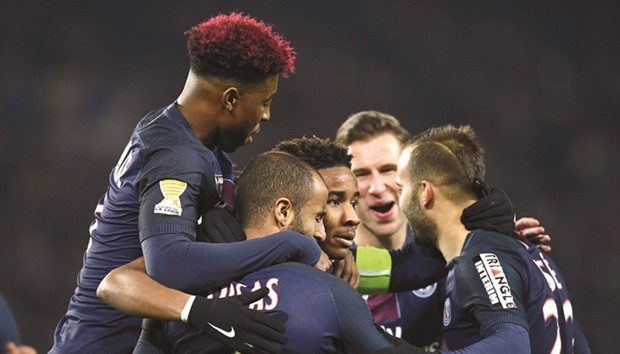 Paris Saint-Germainu2019s Brazilian midfielder Lucas Moura (centre) celebrates with teammates after scoring against Lille in their French League Cup round of 16 clash in Paris on Wednesday. (AFP)