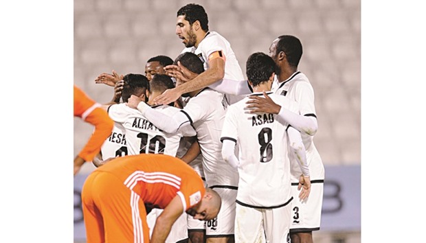 File photo of Al Sadd players celebrating one of their eight goals against Umm Salal in the 11th round of the Qatar Stars League