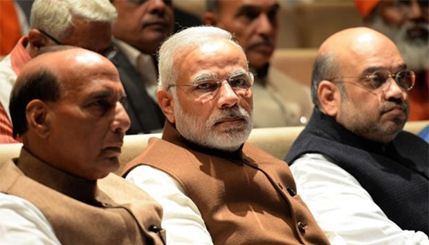 Prime Minister Narendra Modi, Home Minister Rajnath Singh and Bhartiya Janata Party president Amit Shah look on during the BJP's parliamentary committee meeting at Parliament House in New Delhi on Friday.