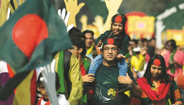 Bangladeshi residents take part in a parade to mark the countryu2019s 45th Victory Day in Dhaka yesterday. Bangladesh, led by the countryu2019s founder Sheikh Mujibur Rahman, won independence from Pakistan after a bitter nine-month war in 1971.