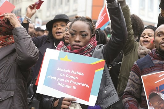Members of the Congolese community in Belgium demonstrate in Brussels yesterday to ask the departure of Congou2019s President Jodeph Kabila at the end of its mandate tomorrow.