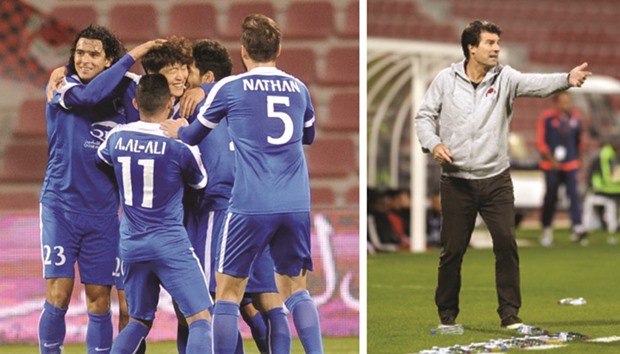 Al Rayyan players including Sebastian Soria (L) congratulate their Korean teammate Koh Myong-jin after he scored against Al Arabi in the Qatar Stars League yesterday. At right, Al Rayyan coach Michael Laudrup reacts during the match.