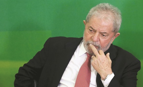 Brazilu2019s former president Luiz Inacio Lula da Silva gestures during his appointment as chief of staff, at Planalto palace in Brasilia, Brazil, March 17, 2016