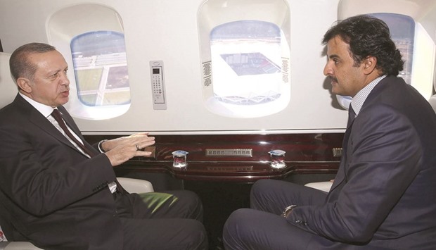 HH the Emir Sheikh Tamim bin Hamad al-Thani and Turkish President Recep Tayyip Erdogan touring Trabzon city in a helicopter.