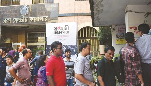 Visitors queue for tickets at the entrance of Dhaka Central Jail in Dhaka.