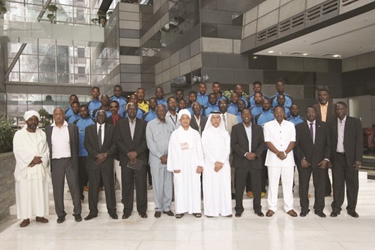 HE the Deputy Prime Minister and Minister of State for Cabinet Affairs Ahmed bin Abdullah bin Zaid al-Mahmoud with a delegation of internally displaced personsu2019 (IDPs) football team from Darfur in Doha yesterday.