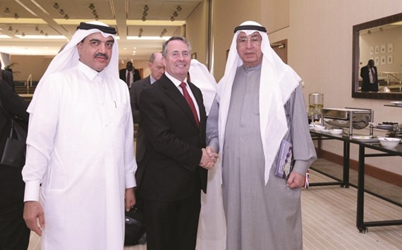 HE Mohamed bin Abdullah al-Rumaihi, Minister of Municipality and Environment, and prominent Qatari businessman Hussain Alfardan with UKu2019s Secretary of State for International Trade and President of the Board of Trade Liam Fox yesterday.
