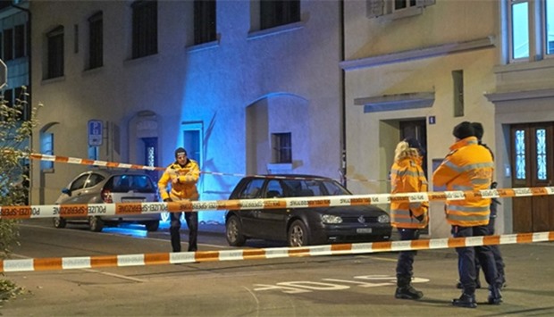 Swiss police are seen outside a Muslim prayer hall, central Zurich