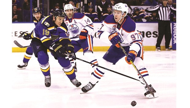 Edmonton Oilers center Connor McDavid (No 97) skates the puck into the offensive zone as he is pressured by St. Louis Blues defenseman Jay Bouwmeester (No 19) during the third period at Scottrade Center. PICTURE: USA TODAY Sports