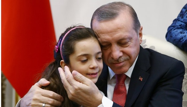 Turkish President Erdogan meets with Syrian girl Bana Alabed, known as Aleppo's tweeting girl, at the Presidential Palace in Ankara