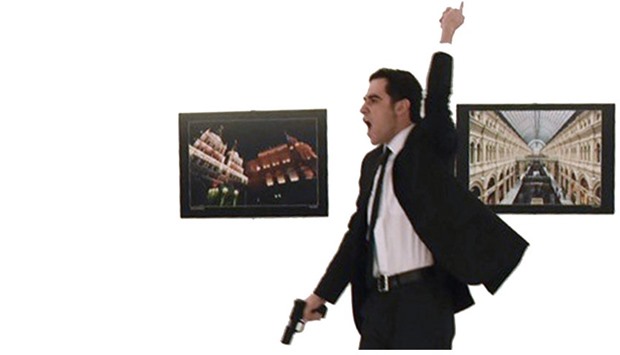 A picture taken on December 19, 2016 shows Mevlut Mert Altintas, the gunman who killed Russia's Ambassador to Turkey, during an attack during a public event in Ankara