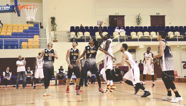 Action from the Qatar Menu2019s League basketball tournament at the Al Gharafa Sports Club yesterday.