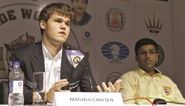 Norwayu2019s Magnus Carlsen (left) and Indiau2019s Viswanathan Anand.