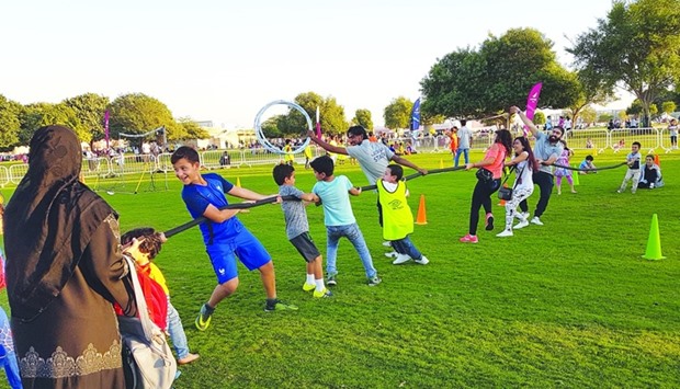 AZF organises a number of recreational activities, including tug of war, for children at Aspire Park