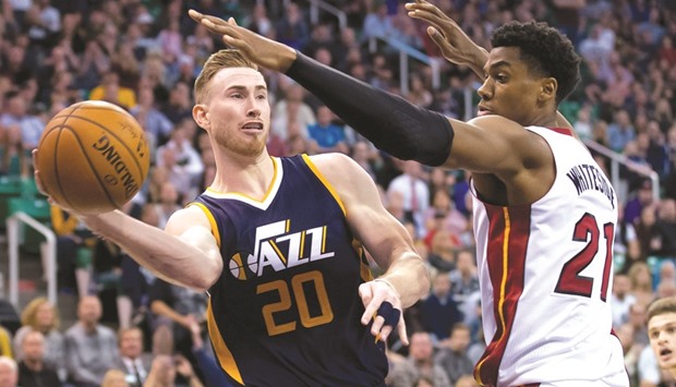 Miami Heat center Hassan Whiteside (R) defends against Utah Jazz forward Gordon Hayward (20) during the second half of their game on Thursday. Miami won 111-110. Picture: Russ Isabella-USA TODAY Sports