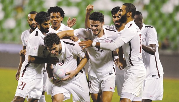 El Jaish defender Lucas Mendes celebrates his goal against Al Ahli with teammates during their Qatar Stars League match yesterday. PICTURES: Shemeer Rasheed