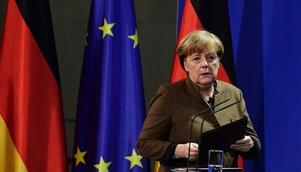 German Chancellor Angela Merkel address a press conference at the Chancellery in Berlin