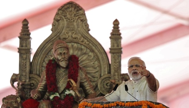 India's Prime Minister Narendra Modi speaks after laying the foundation for the memorial of Chhatrapati Shivaji Maharaj, in Mumbai. Reuters