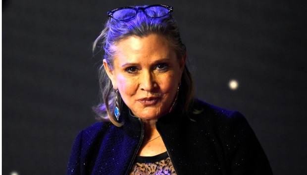 Carrie Fisher poses for cameras as she arrives at the European Premiere of Star Wars, The Force Awakens in Leicester Square, London.  Reuters