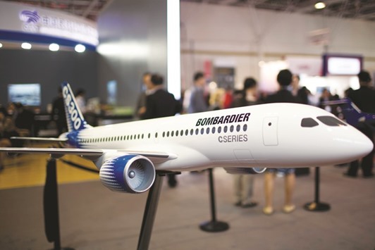 A model of a Bombardier CS300 jet stands on display during the China International Aviation & Aerospace Exhibition in Zhuhai. New rules governing Chinese airline startups are fuelling hopes at Bombardier, Embraer and other regional jet makers for a spike in orders next year.