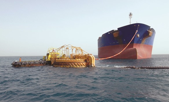 An oil tanker owned by Vela International Marine, a subsidiary of Saudi Aramco, offloads into a single buoy mooring near the port of Ain Sukhna, Egypt (file). Money from a 49% Aramco stake sale will be used by the Public Investment Fund on local and international projects, according to Al Eqtisadiah.