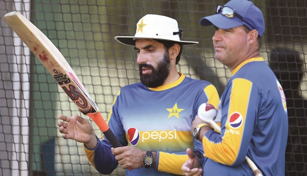Pakistan captain Misbah-ul-Haq (left) with coach Mickey Arthur  during a training session in Melbourne yesterday. (AFP)
