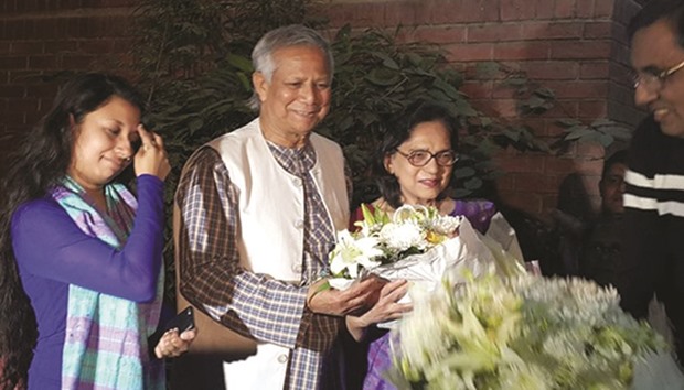Muhammad Yunus, along with his daughter and wife, seen vacating his residence at Grameen Bank Complex in Dhaka yesterday.