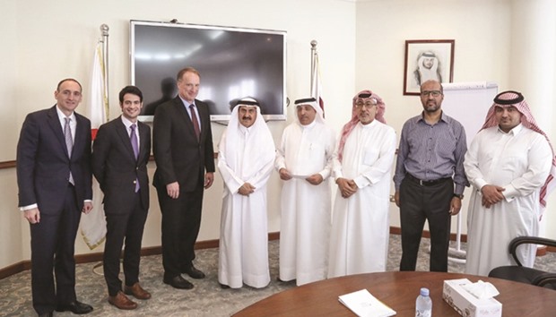 Officials of QRCS and Chevron Phillips Chemical Qatar at the handover ceremony for the donation.