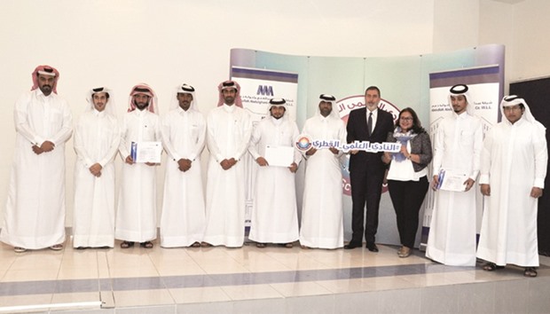 QSC manager al-Jabri and club members with the AAB team led by Toktamis.
