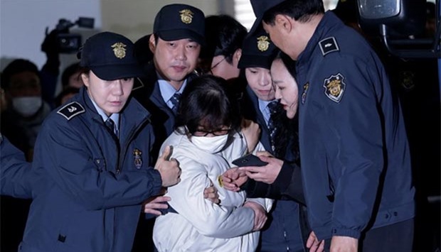 Choi Soon-sil, the jailed confidante of disgraced South Korean President Park Geun-hye, arrives for questioning in Seoul on Saturday.