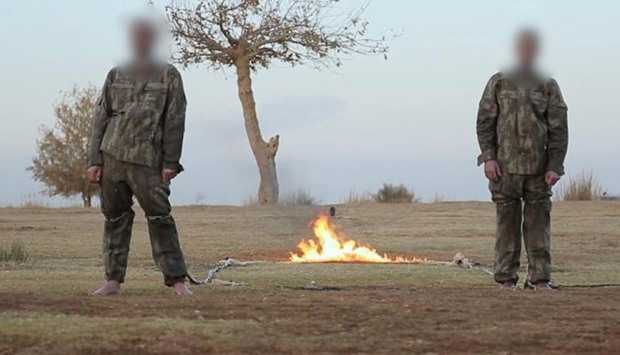 An image grab from a video that purportedly shows the soliders before being burned alive