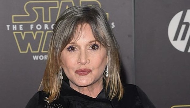 US actress Carrie Fisher is seen in this file photo taken on December 14, 2015 attending the premiere of ,Star Wars: The Force Awakens, in Hollywood, California.
