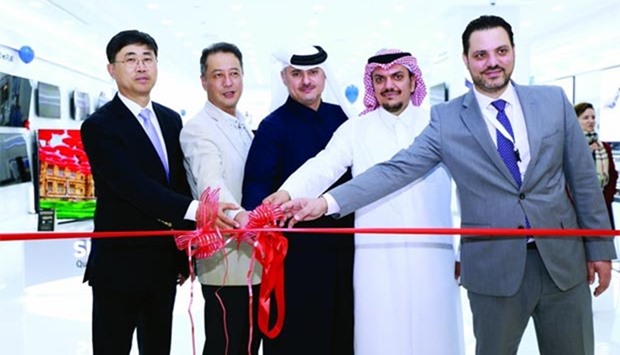 Senior officials of Samsung, Techno Blue, and Mall of Qatar lead the opening of Samsung's first brand shop in the country.