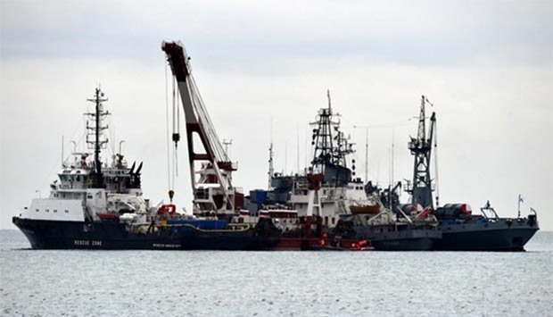 Rescue vessels search the Black Sea outside Sochi on Wednesday, three days after a military plane carrying 92 people, including dozens of members of the Red Army Choir, crashed in the Black Sea.