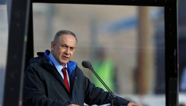 Prime Minister Benjamin Netanyahu speaks during a graduation ceremony for Israeli air force pilots at the Hatzerim air base in southern Israel on Thursday. Israeli media have reported that an investigation against Netanyahu is to involve suspicions of corruption.
