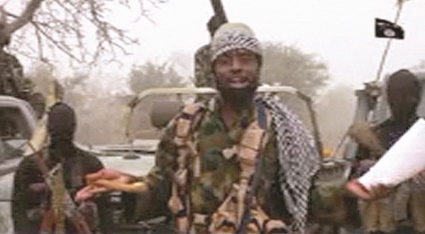 This screen grab image taken yesterday from a video released on YouTube by Boko Haram shows Shekau making a statement at an undisclosed location.