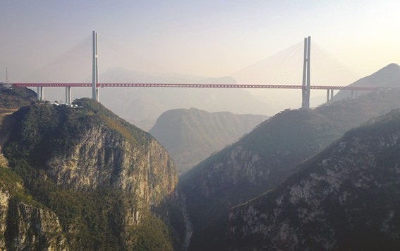 The worldu2019s highest bridge, the Beipanjiang Bridge near Bijie in Guizhou province, has opened to traffic in China.